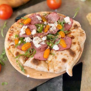 Pizza con postrami