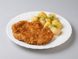 Kotlet schabowy,ziemniaki,surówka