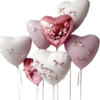 Pastelowe balony z helem z kokardami