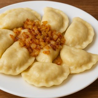 Pierogi z kapustą kiszoną, pieczarkami i grzybami 7szt.