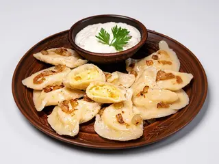 Pierogi ruskie z ziemn.,serem i cebulą 12 szt.