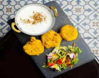 Aloo tikki with muli raita