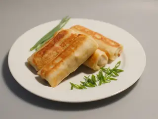 Naleśniki z szynką i serem cheddar na c