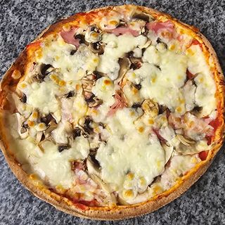 Duża pizza Arabska z szynką i pieczarkami