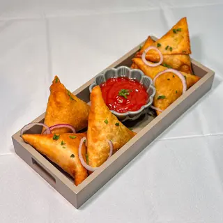 Afrykańskie pierogi z wieprzowiną - 3 szt