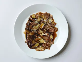 Vaca com molho de ostra