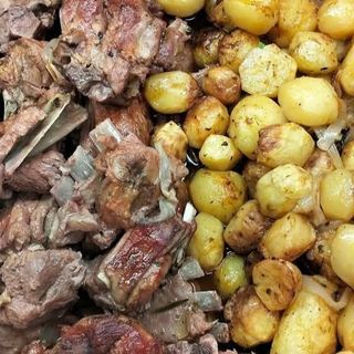 Cabrito assado no forno ½ dose