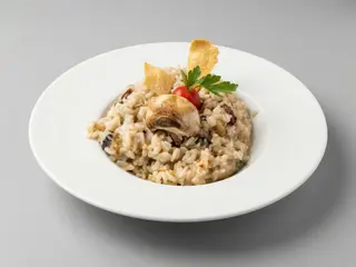 Risotto de cogumelos selvagens e tomate seco