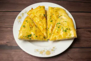 Naan com Queijo e Alho