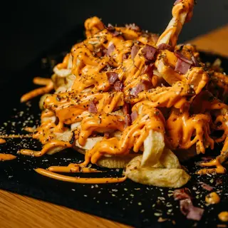 Batata frita com cheddar e bacon