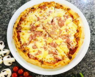 15. Pizza de Ananás