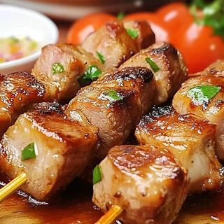 Espetinho de porco com bacon