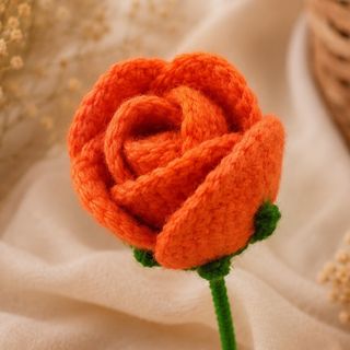 Botão de rosa crochet laranja