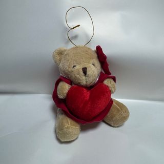 Peluche ursinho pequeno  com laço e coração 