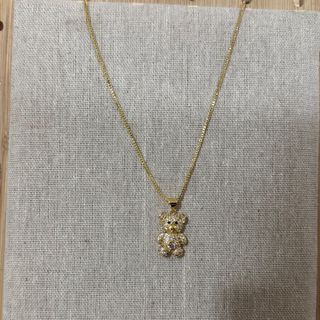 Colar em aço inoxidável dourado com ursinho com brilhantes