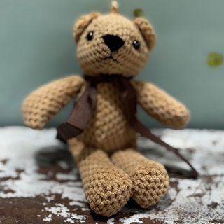 Peluche pequeno castanho 