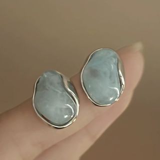 Brincos prateados com pedra turquesa