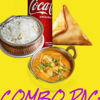 shrimp curry with rice ,vegetables or chicken samosa and coca-cola