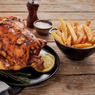 Frango assado na brasa 