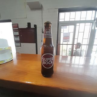 Cerveja super bock 33cle