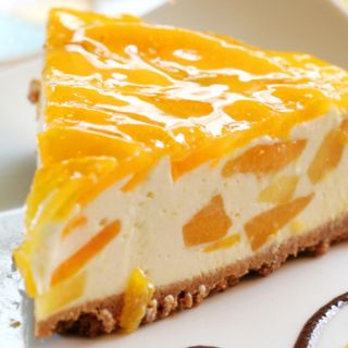 Cheesecake de Tangerina com creme e bolacha Lotus