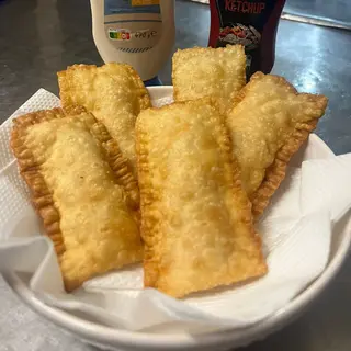 Porção mini pastéis de frango