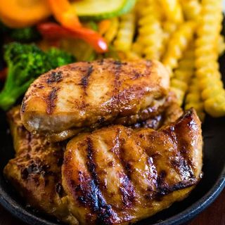 Pri Pri Grilled Chicken Steak With fries and Garlic sauce