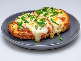 Parmegiana de frango+ bebida 