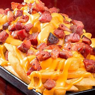 Porção de batata recheada