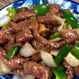 Beef with spring onions orster sause 