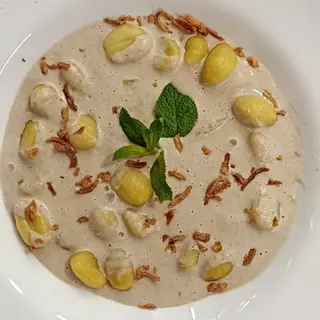 Nhoque ao molho de cogumelos