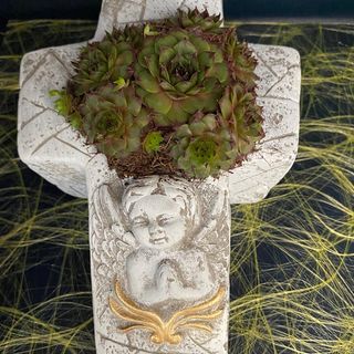 Base cerâmica com anjo