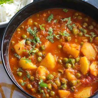 Alu matar with rice