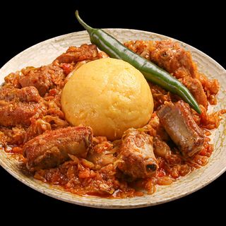 Coaste de porc cu varză călită si mămăligă 