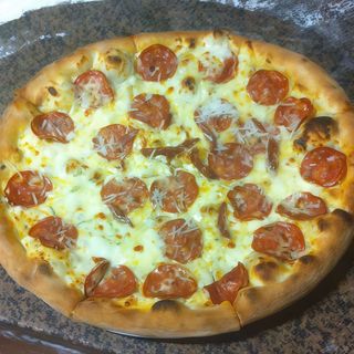 Pizza Suprema Ø 32cm + 1 sos gratis