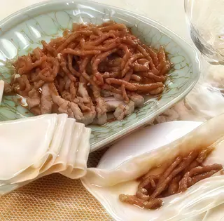 Carne de porc cu praz in sos de soia