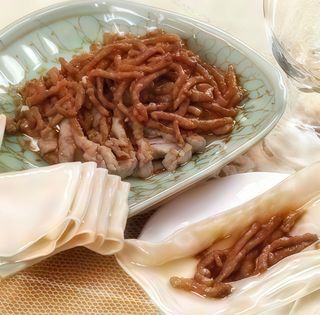 Carne de porc cu praz in sos de soia