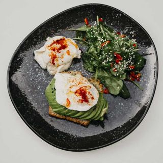 Toast with poached eggs and avocado