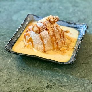 Warm baked apple in puff pastry