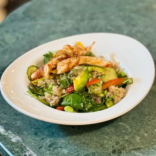 Asian rice salad with grilled chicken breast