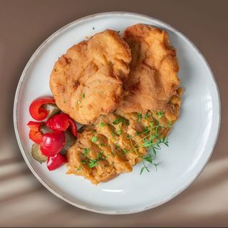 Cotlet de porc pane cu cartofi răntăliți