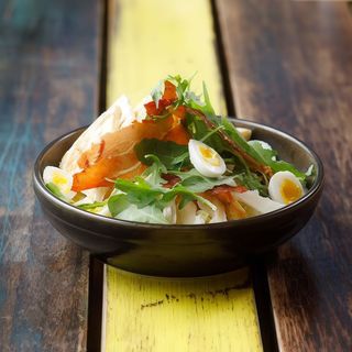 Grilled chicken Caesar salad with parmesan