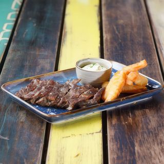 Grilled Beef steak with wedges potatoes and Asian sauce