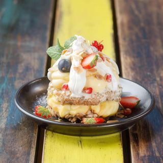 Our Famous Mitzu: crunchy walnut meringue with vanilla cream