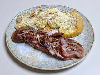 Mușchiuleț de porc împletit la grătar