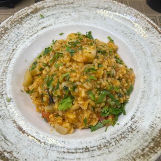 RISOTTO CON GAMBERONI, ZUCCHINI E POMODORI SECCHI