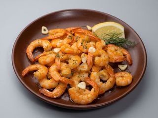 Creveti in unt la tigaie