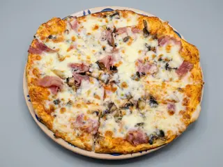 Pizza Prosciutto e funghi 