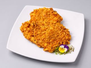Șnițel de porc în fulgi de porumb