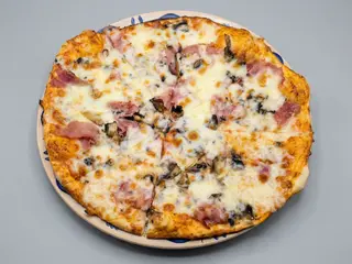 Pizza Prosciutto e funghi 
